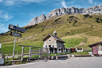 small stone chapel in the french alps in the summer