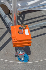 Ballast Weight With Padlock at Movable Scaffold Structure Construction
