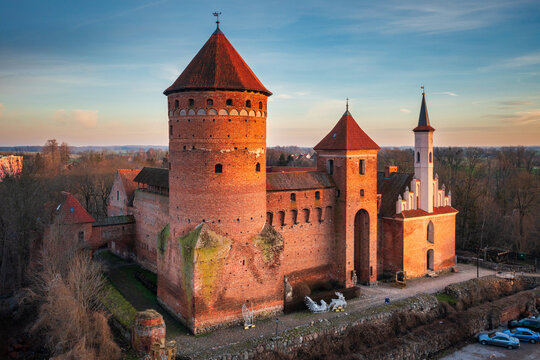 Teutonic castle in Reszel at sunset, Poland.