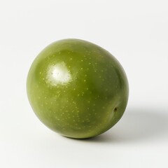 A single green olive sits on a white background. The olive is smooth and slightly wrinkled, with a small stem attached.