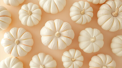 White pumpkins patterned isolated on pale coral pink background, top view. Flat lay Thanksgiving food banner with copy space.