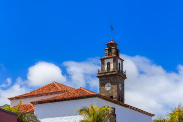 Church of Our Lady of Los Remedios roofs and  bell tower in Buenavista del Norte,Tenerife island, Spain