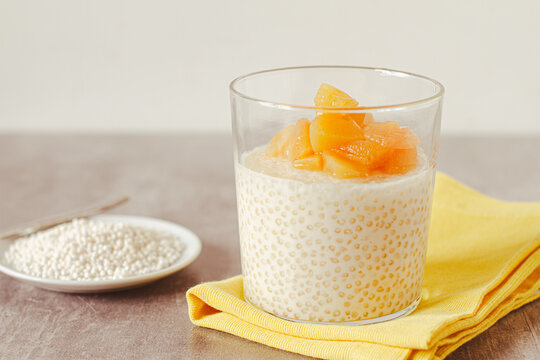 Tapioca pudding with vegan milk and exotic fruits compote