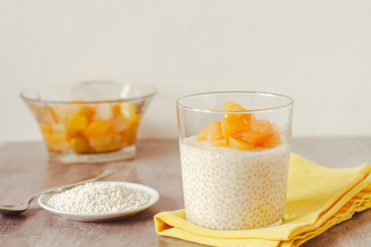 Tapioca pudding with vegan milk and exotic fruits compote