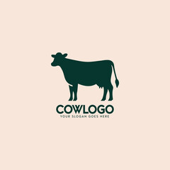 Minimalist standing cow silhouette logo