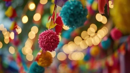 Fotobehang colorful paper decorations and pom-poms against a blurred backdrop of festive lights, perfect for cultural event decor or to enhance the visual appeal of festive marketing materials. © Ярослава Малашкевич