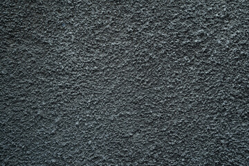 Wall rough cement texture with dark grey color, perfect for Wallpaper or background and copy space for text