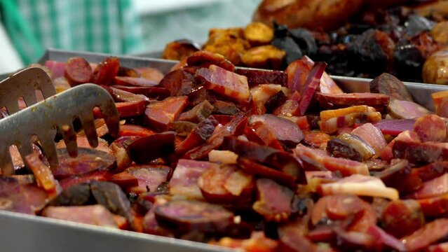 Chorizo (Spanish) or chourico (Portuguese) is type of pork sausage. Traditionally, it uses natural casings made from intestines, a method used since Roman times.