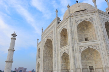 Fototapeta na wymiar AGRA, INDIA - MARCH 17: The people visit Taj Mahal, Agra, India on March 17, 2024. The Taj Mahal is a mausoleum located in Agra, India and is one of the most recognizable structures in the world