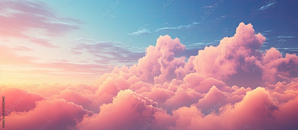 Poster the sun is breaking through the cumulus clouds and casting a warm glow across the sky, creating a pi