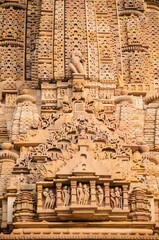 Beautiful stone carved sculptures and design on the outer wall of the Laxman temple, Khajuraho, Madhya Pradesh, India, Asia.