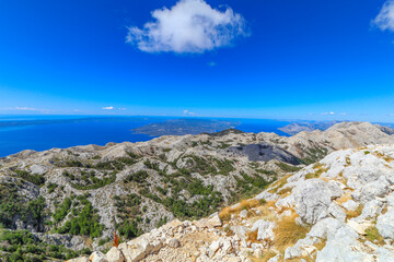 Naklejka premium Sveti Jure Biokovo peak, Dinaric Mountains in Croatia, bird's eye view landscape