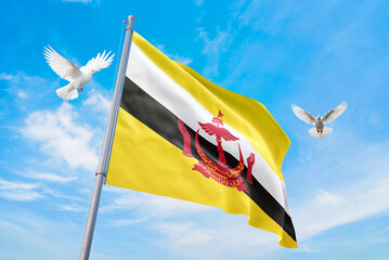 Waving flag of Brunei in beautiful sky and flying pigeons. Brunei flag for independence day. The...