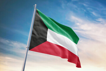 Waving flag of Kuwait in blue sky. Kuwait flag for independence day. The symbol of the state on wavy fabric.