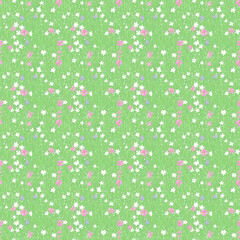 Floral seamless pattern with green grass field and small white, pink and purple flowers. Decorative background for any design.