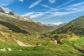 Alpine landscape on Furka Pass, view of the village of Realp, Canton of Uri, Switzerland - obrazy, fototapety, plakaty