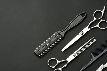 Tools for barbershop on black background studio shot