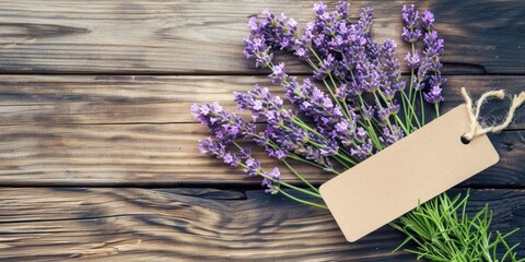 purple lavender with empty paper sign on wooden background