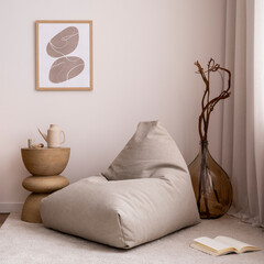 Domestic and cozy interior of living room with mock up poster frame, design pouf, gray carpet,...