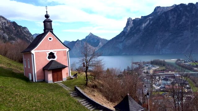Drone flight over Kalvarienberg overlooking Traunsee lake in Ebensee, Salzkammergut region
