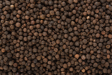 Full frame black pepper peas as background or texture.