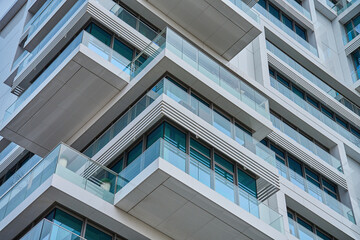 Towering contemporary building in city, Modern architecture exterior with balconies and glass...