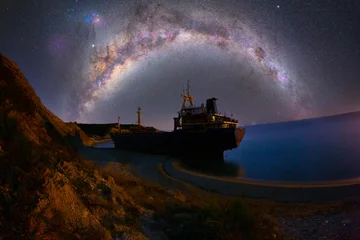 Gordijnen A ship washed ashore, photographed day and night © Samet