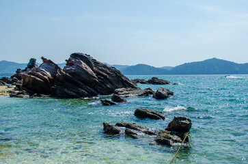 Rocks and stone beach Similan Islands with famous Sail Rock, Phang Nga Thailand nature landscape