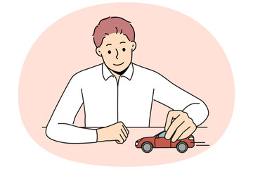 Smiling businessman sit at desk play with red car. Confident man boss or CEO playing with automobile think of next business move. Vector illustration.