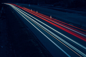 lights of cars driving at night. long exposure