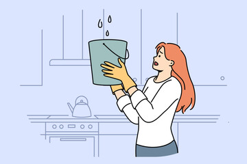 Roof leakage caused flood in house of confused woman, placed bucket under drops. Roof leakage in apartment due to violation of construction rules or problematic neighbors from upper floor © Dzianis Vasilyeu