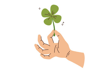 Clover in hand of man who picked plant and made wish to achieve good luck and fortune. Green quatrefoil clover symbolizes holiday of Saint Patrick Day promising growth or prosperity