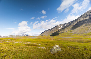 A beautiful summer landscape with mountains of Sarek National Park, Sweden. Wild scenery of Northern Europe.
