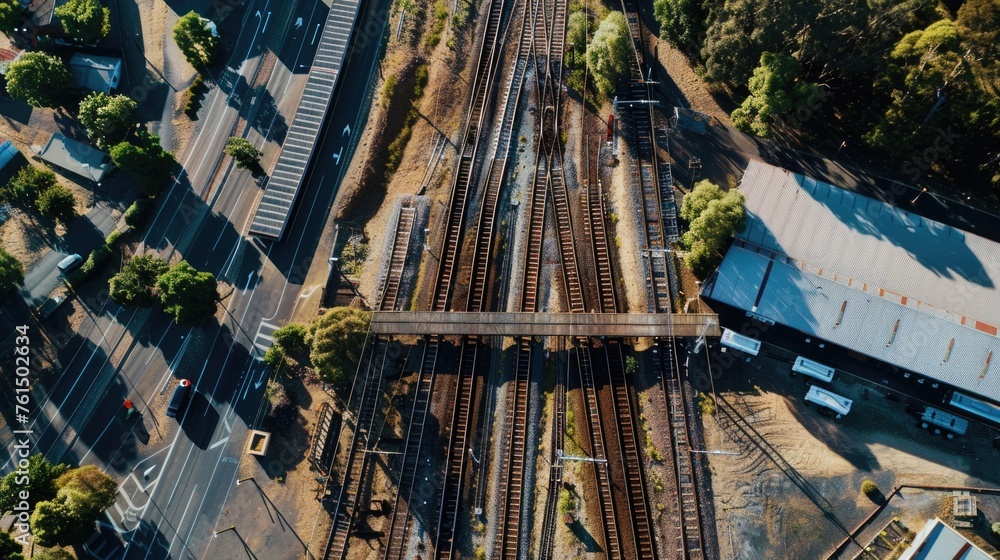 Poster aerial view of a train track and station. suitable for transportation concepts