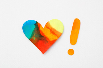 Multicolored heart with exclamation mark, joy at its finest