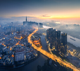 
Sunrise on the tallest Landmark 81 building in Vietnam, with a beautiful curved road. Photo was taken in November 2023.