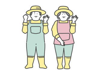 農家で働く笑顔な高齢夫婦　OKポーズ