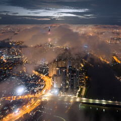 
The top of the Landmark 81 building, the tallest in Vietnam, floats in the clouds. Photo taken in...