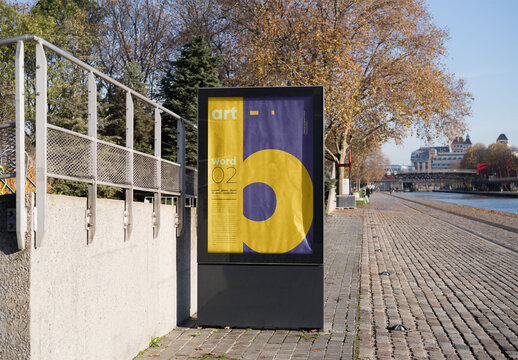 Mockup of customizable vertical sign by wall