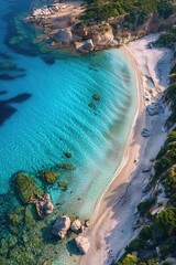 Fototapeta premium Aerial view of a sandy beach and clear water. Perfect for travel websites