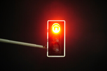 Red traffic light at night