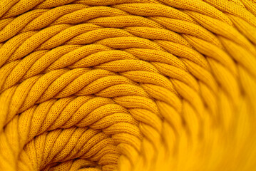 Skein of yellow braided synthetic cord, close-up shot - obrazy, fototapety, plakaty
