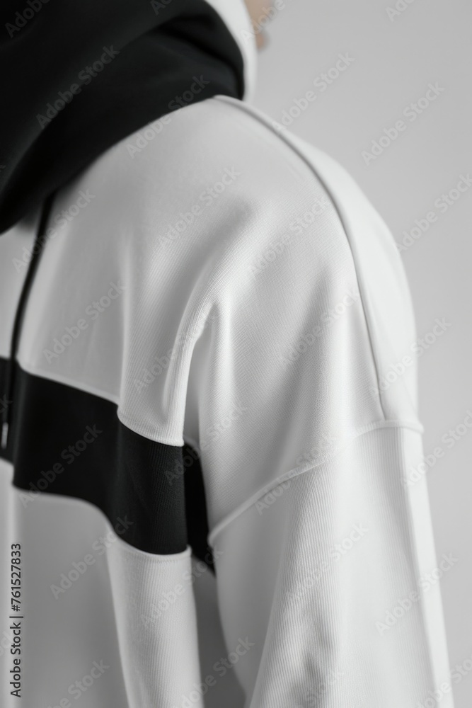 Poster close up of a person wearing a hoodie, suitable for various concepts and projects