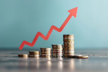 Financial business market money growth concept. Stacks of gold coins with rising arrow global economy prices increase, bank investment revenue. Stock exchange trading charts data background.
