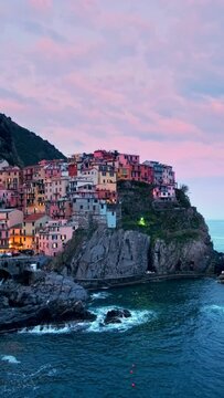 Manarola village popular tourist destination in Cinque Terre National Park a UNESCO World Heritage Site, Liguria, Italy in the evening with dramatic sky