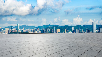 Empty square floors and city skyline with modern buildings in Shenzhen. Panoramic view.