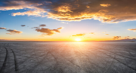 Asphalt road square with beautiful sky clouds landscape at sunset. Panoramic view.