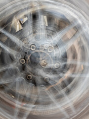 The motion blurred image of the vehicle wheel - 761540842