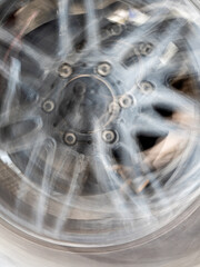 The motion blurred image of the vehicle wheel - 761540868
