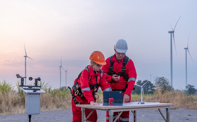 Engineers turbine windmill work in turbine farms rotation resource from windmill turbine model...